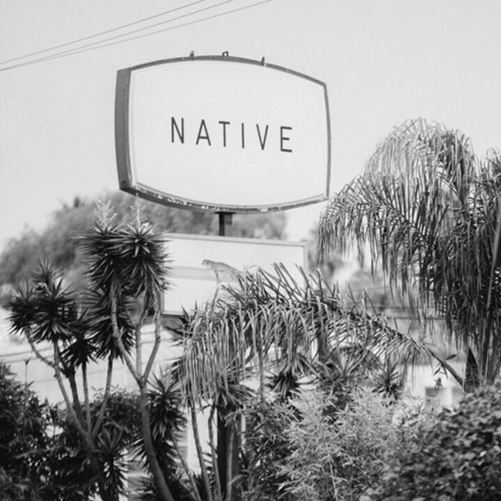 black and white image of Native Hotel exterior sign